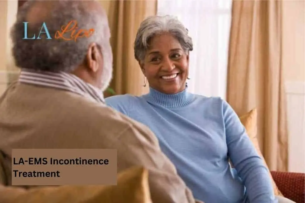 Couple sat smiling at each other - LA-EMS treatment North Kensington