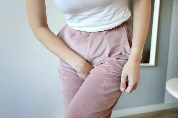woman running for the toilet because of urinary incontinence North Kensington